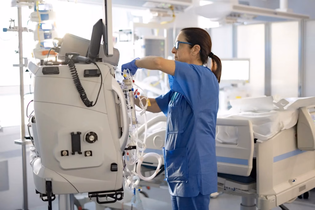 Nurse setting up equipment